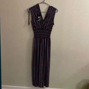 Striped dress with skirt and outer layer covering